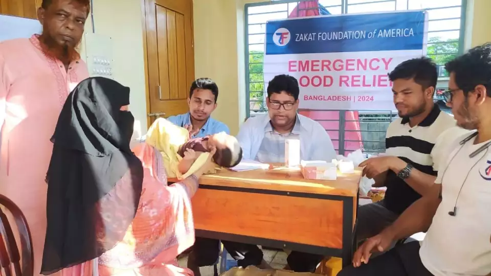 Medical care is provided to flood affected families in Bangladesh.