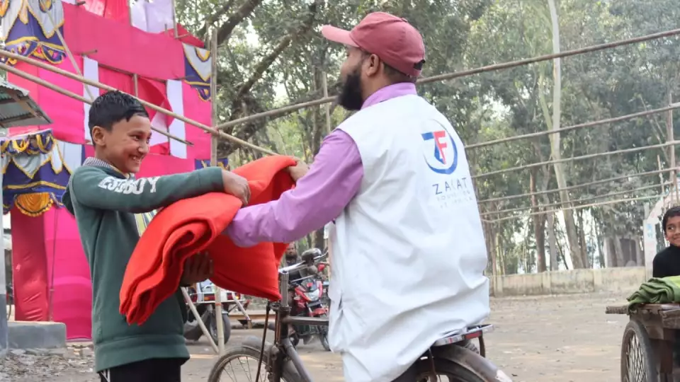 Bangladesh flood relief efforts reach vulnerable families with essentials.