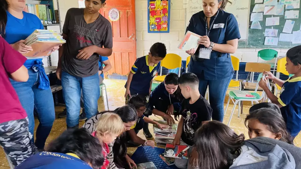 Our field reps in Colombia set up a story time circle for children.