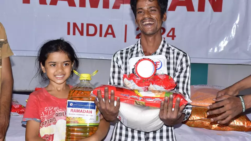 The joy of receiving a Ramadan food package in India is contagious.
