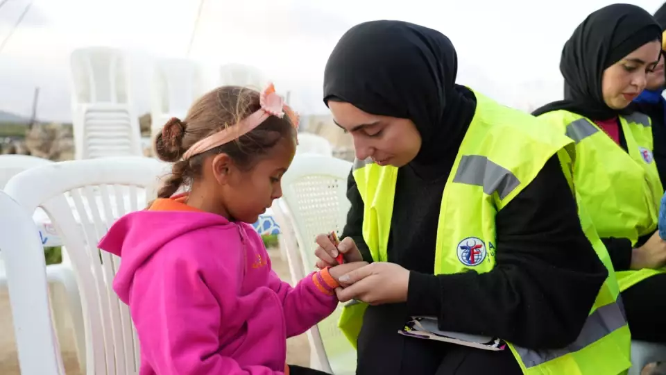 Children enjoy face and hand paint at our community iftar for needy families in Lebanon.