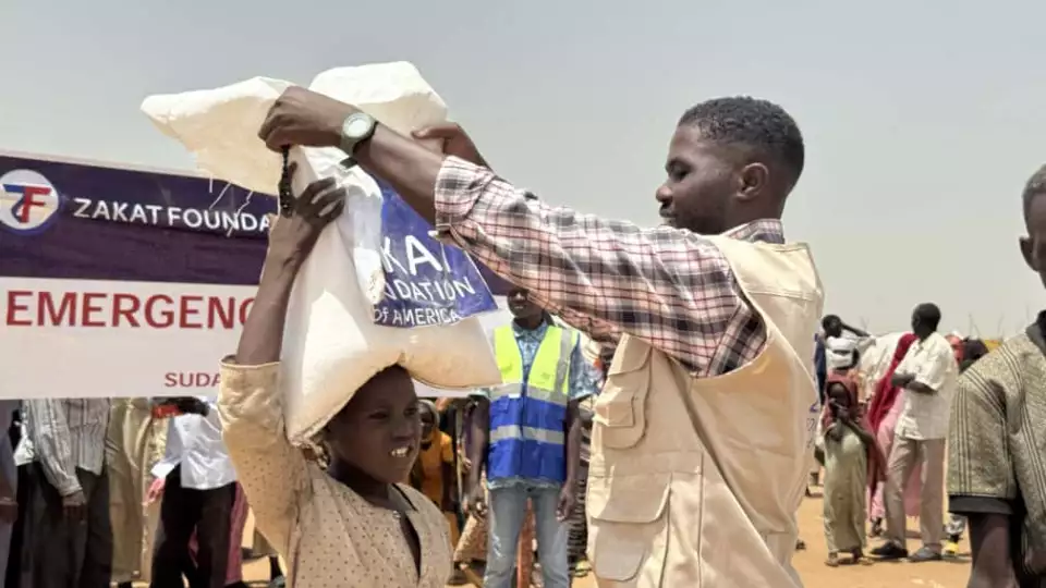 Displaced families in Tawila refugee camp in North Darfur Sudan receieve food packages from our teams
